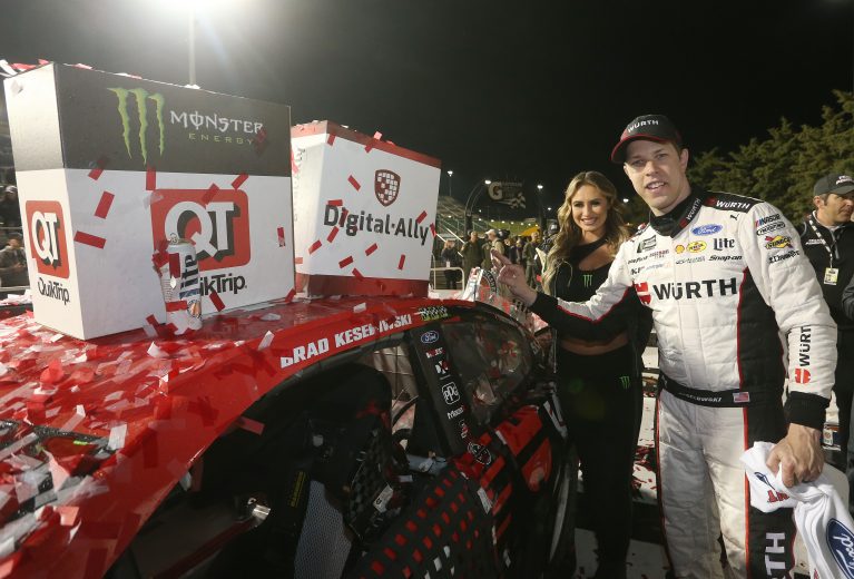 KANSAS CITY, KS - MAY 11:  Brad Keselowski, driver of the #2 Wurth Ford, poses with the winners sticker after the Monster Energy NASCAR Cup Series Digital Ally 400 at Kansas Speedway on May 11, 2019 in Kansas City, Kansas.  (Photo by Brian Lawdermilk/Getty Images) | Getty Images