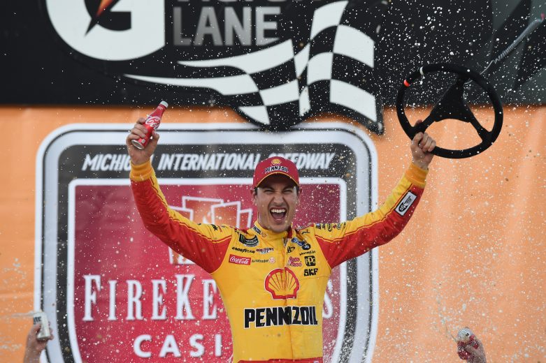 BROOKLYN, MICHIGAN - JUNE 10: Joey Logano, driver of the #22 Shell Pennzoil Ford, celebrates in Victory Lane after winning the Monster Energy NASCAR Cup Series FireKeepers Casino 400 at Michigan International Speedway on June 10, 2019 in Brooklyn, Michigan. (Photo by Logan Riely/Getty Images) | Getty Images