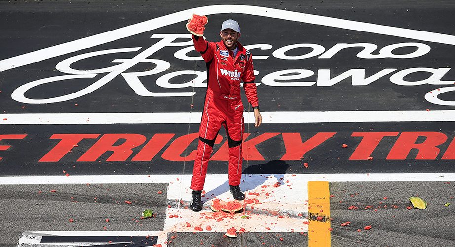 LONG POND, PENNSYLVANIA - JULY 27: Ross Chastain, driver of the #45 Niece/Acurlite Chevrolet, celebrates by smashing a watermelon following his victory in the NASCAR Gander Outdoors Truck Series Gander RV 150 at Pocono Raceway on July 27, 2019 in Long Pond, Pennsylvania. (Photo by Chris Trotman/Getty Images) | Getty Images