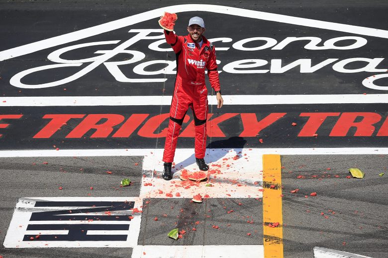 LONG POND, PENNSYLVANIA - JULY 27: Ross Chastain, driver of the #45 Niece/Acurlite Chevrolet, celebrates by smashing a watermelon following his victory in the NASCAR Gander Outdoors Truck Series Gander RV 150 at Pocono Raceway on July 27, 2019 in Long Pond, Pennsylvania. (Photo by Chris Trotman/Getty Images) | Getty Images