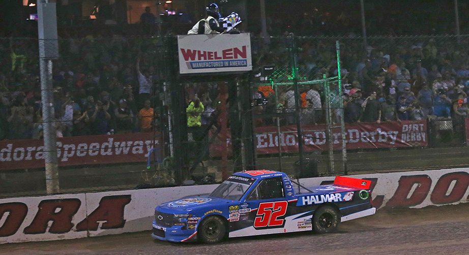 ROSSBURG, OHIO - AUGUST 01: Stewart Friesen, driver of the #52 Halmar International Chevrolet, takes the checkered flag to win the NASCAR Gander Outdoor Truck Series Eldora Dirt Derby at Eldora Speedway on August 01, 2019 in Rossburg, Ohio. (Photo by Matt Sullivan/Getty Images) | Getty Images