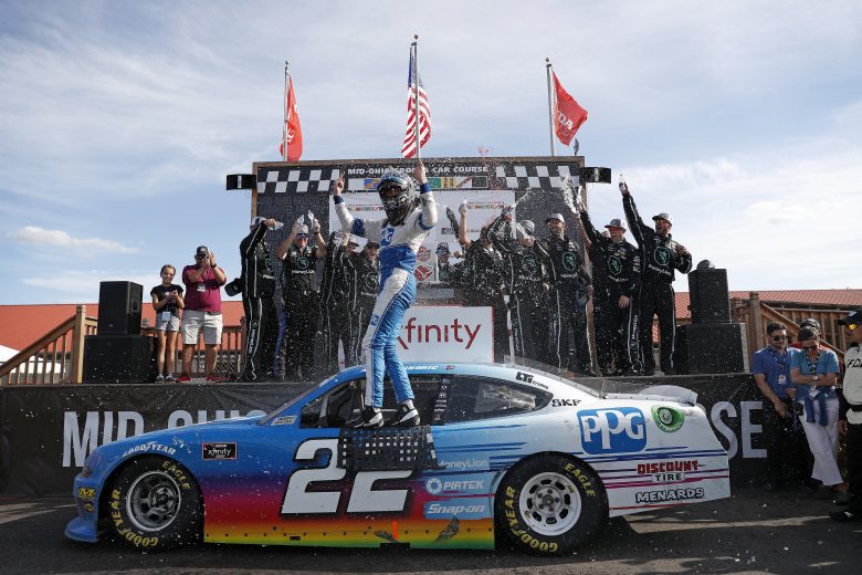 LEXINGTON, OHIO - AUGUST 10: Austin Cindric, driver of the #22 PPG Ford, celebrates after winning the B&L Transport 170 at Mid-Ohio Sports Car Course on August 10, 2019 in Lexington, Ohio. (Photo by Meg Oliphant/Getty Images) | Getty Images