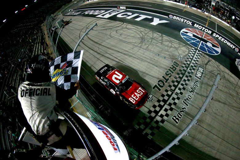 BRISTOL, TENNESSEE - AUGUST 16: Tyler Reddick, driver of the #2 Tame the BEAST Chevrolet, takes the checkered flag to win the NASCAR Xfinity Series Food City 300 at Bristol Motor Speedway on August 16, 2019 in Bristol, Tennessee. (Photo by Sean Gardner/Getty Images) | Getty Images