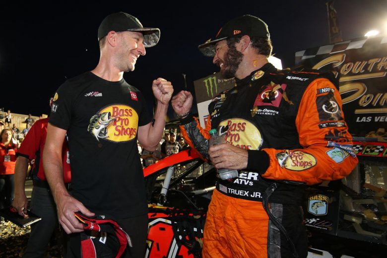 LAS VEGAS, NEVADA - SEPTEMBER 15: Martin Truex Jr., driver of the #19 Bass Pro Shops Toyota, and crew chief Cole Pearn celebrates in victory lane after winning the Monster Energy NASCAR Cup Series South Point 400 at Las Vegas Motor Speedway on September 15, 2019 in Las Vegas, Nevada. (Photo by Chris Graythen/Getty Images) | Getty Images