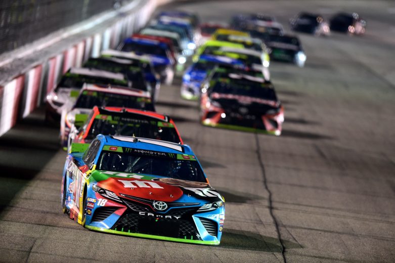 RICHMOND, VIRGINIA - SEPTEMBER 21: Kyle Busch, driver of the #18 M&M's Hazelnut Toyota, leads a pack of cars during the Monster Energy NASCAR Cup Series Federated Auto Parts 400 at Richmond Raceway on September 21, 2019 in Richmond, Virginia. (Photo by Jared C. Tilton/Getty Images) | Getty Images
