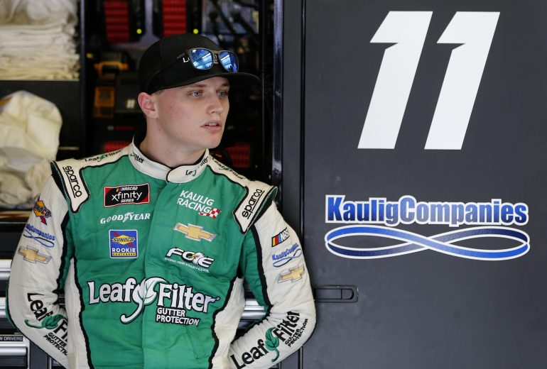 CHARLOTTE, NORTH CAROLINA - SEPTEMBER 27: Justin Haley, driver of the #11 LeafFilter Gutter Protection Chevrolet, stands in the garage area during practice for the NASCAR Xfinity Series Drive for the Cure 250 presented by Blue Cross Blue Shield of North Carolina at Charlotte Motor Speedway on September 27, 2019 in Charlotte, North Carolina. (Photo by Brian Lawdermilk/Getty Images) | Getty Images
