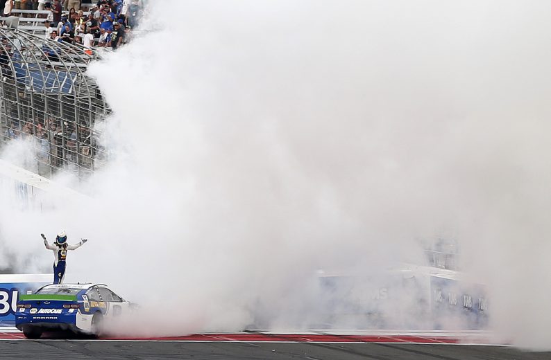 CHARLOTTE, NORTH CAROLINA - SEPTEMBER 29: Chase Elliott, driver of the #9 NAPA Auto Parts Chevrolet, celebrates after winning the Monster Energy NASCAR Cup Series Bank of America ROVAL 400 at Charlotte Motor Speedway on September 29, 2019 in Charlotte, North Carolina. (Photo by Brian Lawdermilk/Getty Images) | Getty Images