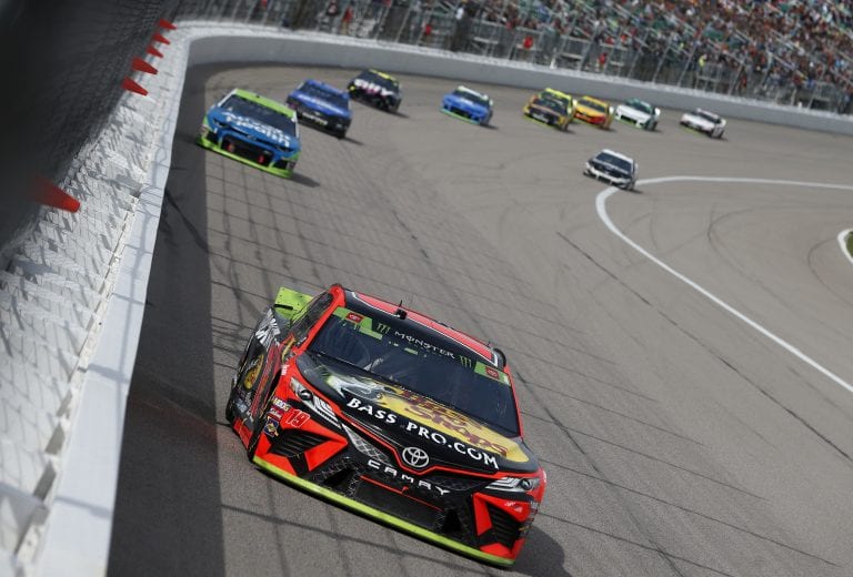 KANSAS CITY, KANSAS - OCTOBER 20: Martin Truex Jr., driver of the #19 Bass Pro Shops Toyota, leads a pack of cars during the Monster Energy NASCAR Cup Series Hollywood Casino 400 at Kansas Speedway on October 20, 2019 in Kansas City, Kansas. (Photo by Brian Lawdermilk/Getty Images) | Getty Images