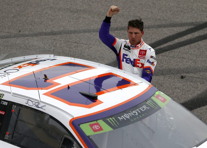 KANSAS CITY, KANSAS - OCTOBER 20: Denny Hamlin, driver of the #11 FedEx Office Toyota, celebrates his victory after the Monster Energy NASCAR Cup Series Hollywood Casino 400 at Kansas Speedway on October 20, 2019 in Kansas City, Kansas. (Photo by Jonathan Ferrey/Getty Images) | Getty Images