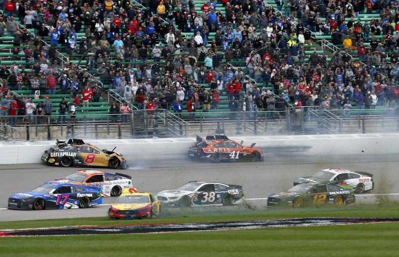 KANSAS CITY, KANSAS - OCTOBER 20: Daniel Hemric, driver of the #8 Caterpillar Chevrolet, Joey Logano, driver of the #22 Shell Pennzoil Ford, and Daniel Suarez, driver of the #41 ARRIS Ford, are involved in an on-track incident during the Monster Energy NASCAR Cup Series Hollywood Casino 400 at Kansas Speedway on October 20, 2019 in Kansas City, Kansas. (Photo by Brian Lawdermilk/Getty Images) | Getty Images