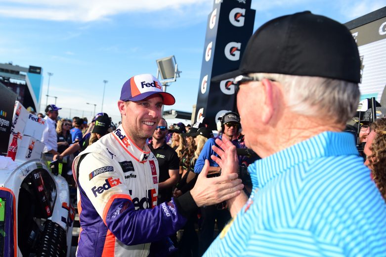 AVONDALE, ARIZONA - NOVEMBER 10: Denny Hamlin, driver of the #11 FedEx Ground Toyota, is congratulated in Victory Lane by team owner Joe Gibbs after winning the Monster Energy NASCAR Cup Series Bluegreen Vacations 500 at ISM Raceway on November 10, 2019 in Avondale, Arizona. (Photo by Jared C. Tilton/Getty Images) | Getty Images