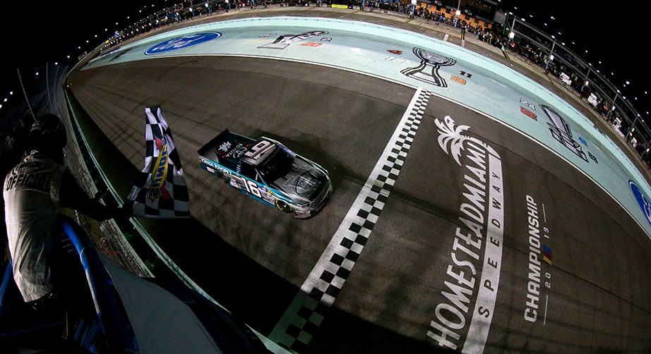 HOMESTEAD, FLORIDA - NOVEMBER 15: Austin Hill, driver of the #16 Chiba Toyopet Toyota, takes the checkered flag to win the NASCAR Gander Outdoors Truck Series Ford EcoBoost 200 at Homestead-Miami Speedway on November 15, 2019 in Homestead, Florida. (Photo by Sean Gardner/Getty Images) | Getty Images