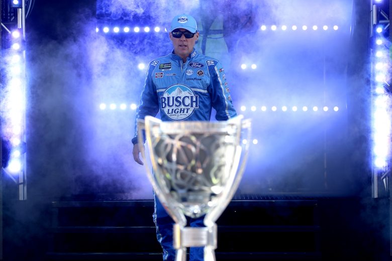 HOMESTEAD, FLORIDA - NOVEMBER 17: Kevin Harvick, driver of the #4 Busch Light Ford, walks across the stage during driver introductions during the Monster Energy NASCAR Cup Series Ford EcoBoost 400 at Homestead Speedway on November 17, 2019 in Homestead, Florida. (Photo by Jonathan Ferrey/Getty Images) | Getty Images