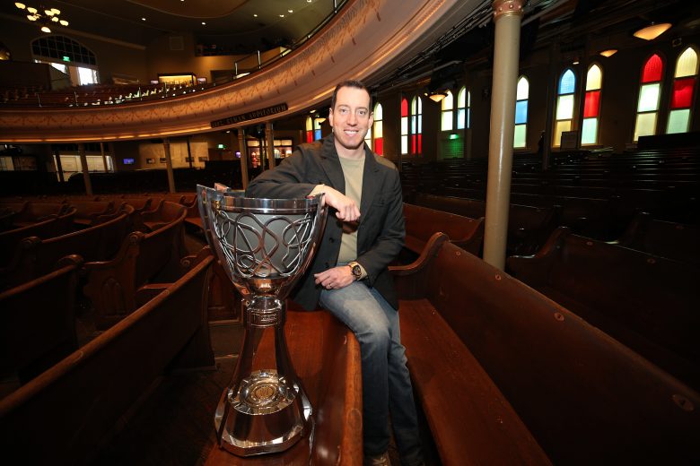 NASHVILLE, TENNESSEE - DECEMBER 04: Monster Energy NASCAR Cup Series Champion Kyle Busch poses for a photo with the Championship Trophy at the Ryman Auditorium on December 04, 2019 in Nashville, Tennessee. (Photo by Chris Graythen/Getty Images) | Getty Images
