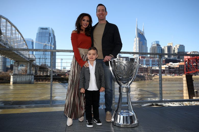 NASHVILLE, TENNESSEE - DECEMBER 04: Monster Energy NASCAR Cup Series Champion Kyle Busch, along with his wife Samantha and son Brexton pose for a photo at the Ryman Auditorium with the Championship Trophy on December 04, 2019 in Nashville, Tennessee. (Photo by Chris Graythen/Getty Images) | Getty Images