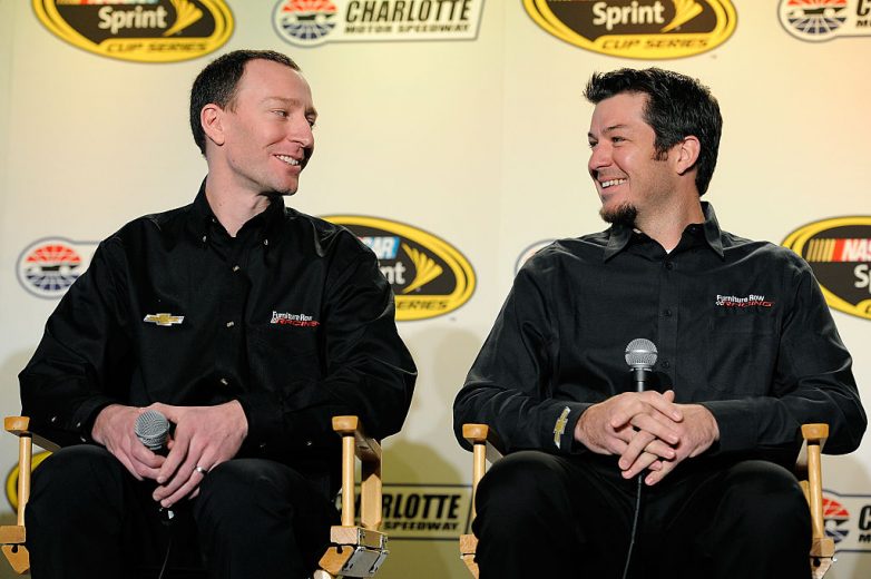 CHARLOTTE, NC - JANUARY 29:  Cole Pearn (L), crew chief of the #78 Furniture Row Chevrolet, and Martin Truex Jr., driver of the #78 Furniture Row Chevrolet, share a laugh during day 4 of the Charlotte Motor Speedway NASCAR Media Tour at the Charlotte Convention Center on January 29, 2015 in Charlotte, North Carolina.  (Photo by Jared C. Tilton/NASCAR via Getty Images)