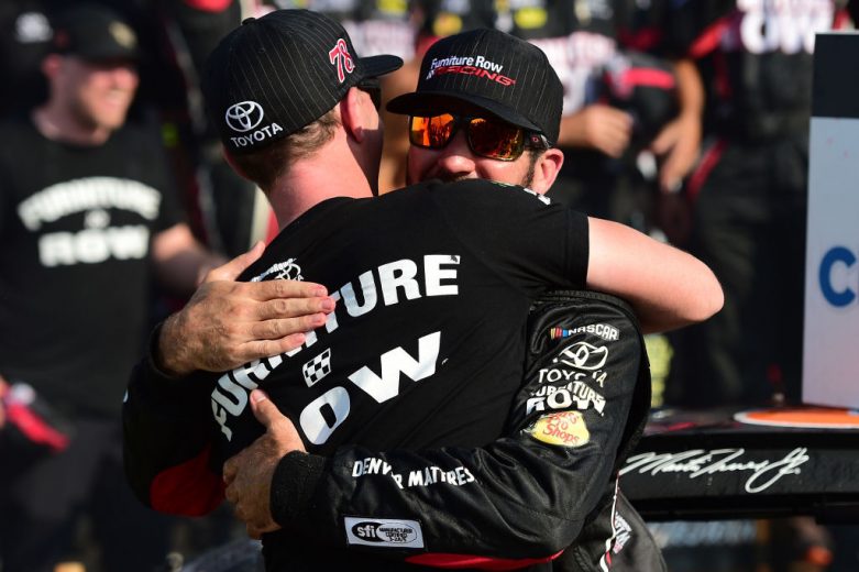 WATKINS GLEN, NY - AUGUST 06:  Martin Truex Jr., driver of the #78 Furniture Row/Denver Mattress Toyota, and crew chief Cole Pearn celebrate in victory lane after winning the Monster Energy NASCAR Cup Series I Love NY 355 at The Glen at Watkins Glen International on August 6, 2017 in Watkins Glen, New York.  (Photo by Jared C. Tilton/Getty Images) | Getty Images
