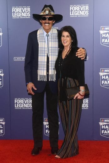 CHARLOTTE, NORTH CAROLINA - JANUARY 31: NASCAR Hall of Famer Richard Petty and Ellen Hill pose on the red carpet prior to the 2020 NASCAR Hall of Fame Induction Ceremony at Charlotte Convention Center on January 31, 2020 in Charlotte, North Carolina. (Photo by Jared C. Tilton/Getty Images) | Getty Images