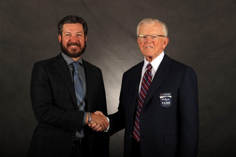 CHARLOTTE, NORTH CAROLINA - JANUARY 31: 2020 NASCAR Hall of Fame Inductee, Joe Gibbs, poses for a portrait with Martin Truex Jr. during the 2020 NASCAR Hall of Fame Induction Ceremony at the Charlotte Convention Center on January 31, 2020 in Charlotte, North Carolina. (Photo by Streeter Lecka/Getty Images) | Getty Images