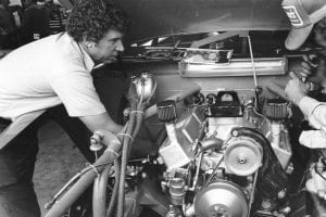 UNKNOWN: Waddell Wilson checks over the engine of Cale YarboroughÕs NASCAR Cup car in the garage area before a Cup race. A Wilson-built engine was the first to run a lap at over 200 mph at the Daytona International Speedway in qualifying for the 1983 Daytona 500. Unfortunately, driver Yarborough flipped on his second qualifying lap and the run was never considered official. Undaunted, the team rolled out a back-up car and won the 500 that year. (Photo by ISC Images and Archives via Getty Images)