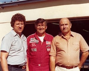 1981: Crew chief Waddell Wilson (L), driver Bobby Allison (C) and car owner Harry Ranier (R) take a moment for a photo at a NASCAR Cup race. Ranier’s team scored five victories during season and finished second in Cup points. (Photo by ISC Images & Archives via Getty Images)