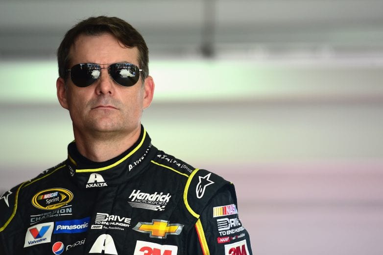 HOMESTEAD, FL - NOVEMBER 20: Jeff Gordon, driver of the #24 AXALTA Chevrolet, stands in the garage area during practice for the NASCAR Sprint Cup Series Ford EcoBoost 400 at Homestead-Miami Speedway on November 20, 2015 in Homestead, Florida. (Photo by Jared C. Tilton/NASCAR via Getty Images)