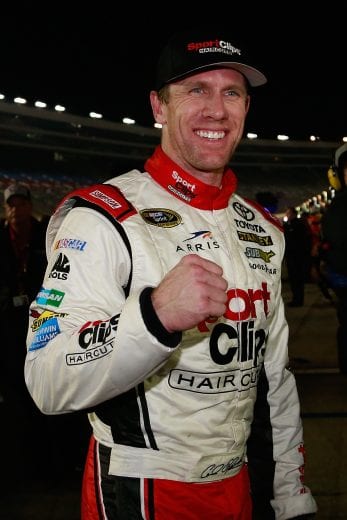 FORT WORTH, TX - NOVEMBER 06: Carl Edwards, driver of the #19 Sport Clips Toyota, celebrates winning the rain-shortened NASCAR Sprint Cup Series AAA Texas 500 at Texas Motor Speedway on November 6, 2016 in Fort Worth, Texas. (Photo by Matt Sullivan/NASCAR via Getty Images)