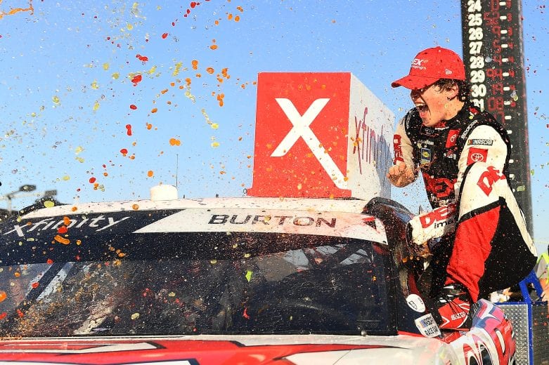 FONTANA, CALIFORNIA - FEBRUARY 29: Harrison Burton, driver of the #20 Dex Imaging Toyota, celebrates in Victory Lane after winning the NASCAR Xfinity Series Production Alliance Group 300 at Auto Club Speedway on February 29, 2020 in Fontana, California. (Photo by Stacy Revere/Getty Images) | Getty Images
