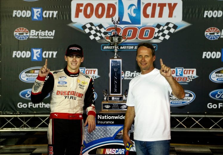 BRISTOL, TN - AUGUST 22: Ryan Blaney, driver of the #22 Discount Tire Ford, and his dad Dave Blaney pose with the trophy after winning the NASCAR Nationwide Series Food City 300 at Bristol Motor Speedway on August 22, 2014 in Bristol, Tennessee. (Photo by Sean Gardner/Getty Images) | Getty Images