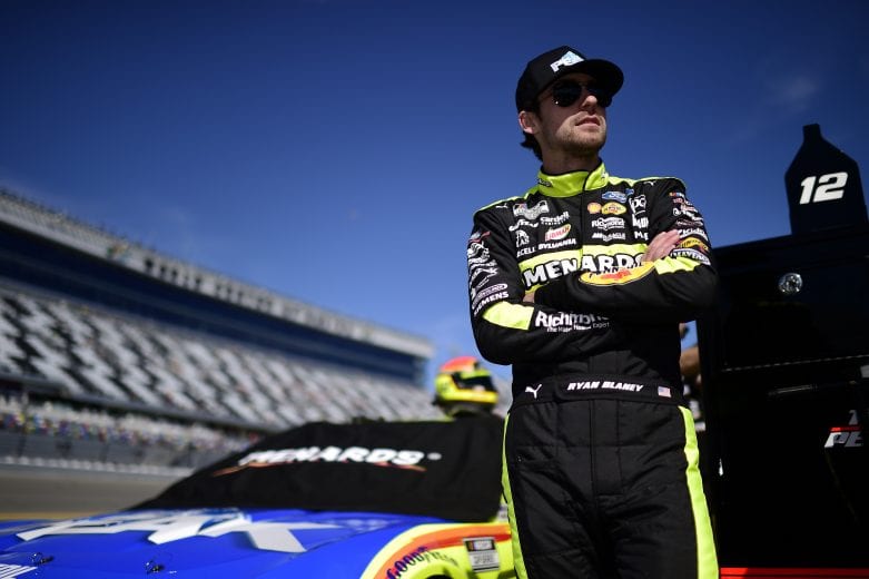 DAYTONA BEACH, FLORIDA - FEBRUARY 09: Ryan Blaney, driver of the #12 Menards/Peak Ford, stands on the grid during qualifying for the NASCAR Cup Series 62nd Annual Daytona 500 at Daytona International Speedway on February 09, 2020 in Daytona Beach, Florida. (Photo by Jared C. Tilton/Getty Images) | Getty Images