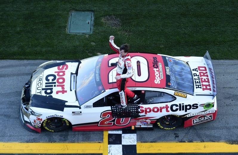 DAYTONA BEACH, FLORIDA - FEBRUARY 09: Erik Jones, driver of the #20 Sport Clips Toyota, celebrates winning the NASCAR Cup Series Busch Clash at Daytona International Speedway on February 09, 2020 in Daytona Beach, Florida. (Photo by Jared C. Tilton/Getty Images) | Getty Images