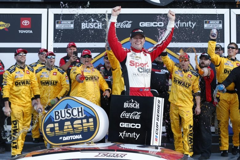 DAYTONA BEACH, FLORIDA - FEBRUARY 09: Erik Jones, driver of the #20 Sport Clips Toyota, celebrates in Victory Lane after winning the NASCAR Cup Series Busch Clash at Daytona International Speedway on February 09, 2020 in Daytona Beach, Florida. (Photo by Brian Lawdermilk/Getty Images) | Getty Images