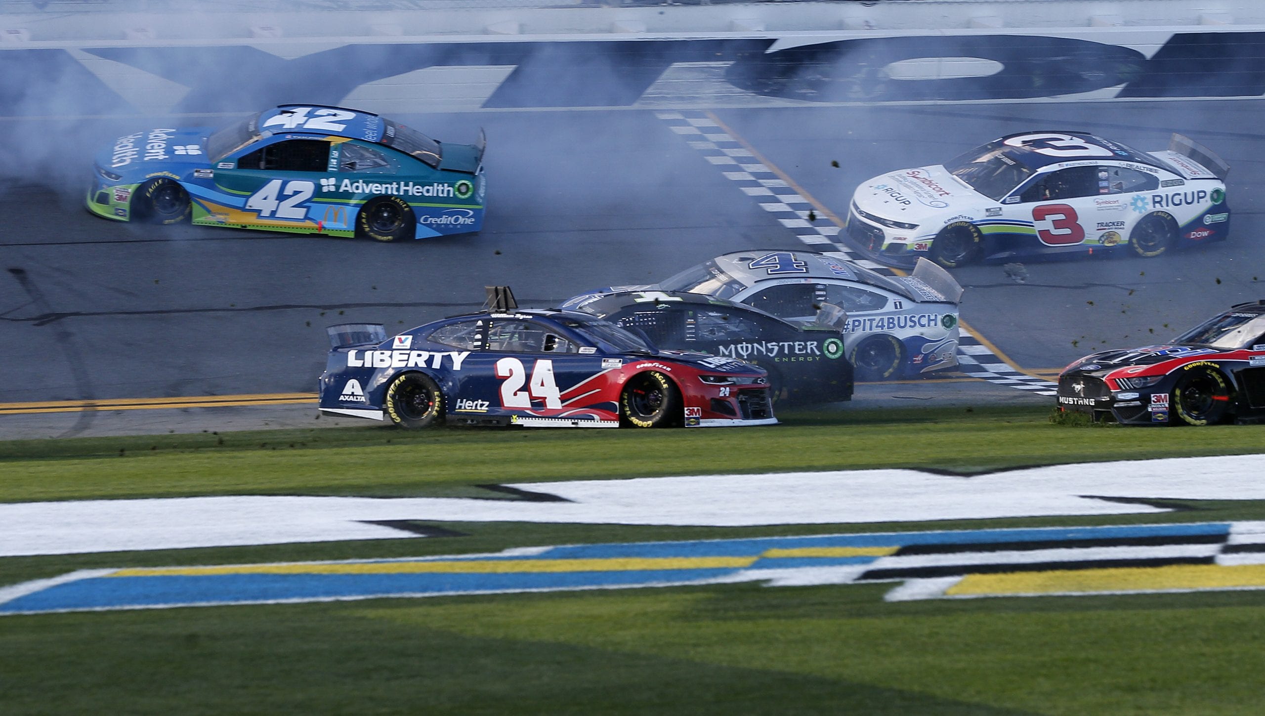 DAYTONA BEACH, FLORIDA - FEBRUARY 09: Kyle Larson, driver of the #42 Advent Health Chevrolet, William Byron, driver of the #24 Liberty University Chevrolet, Kurt Busch, driver of the #1 Monster Energy Chevrolet, Kevin Harvick, driver of the #4 Busch Light #PIT4BUSCH Ford, and Austin Dillon, driver of the #3 Symbicort/Rig Up Chevrolet, are involved in an on-track incident during the NASCAR Cup Series Busch Clash at Daytona International Speedway on February 09, 2020 in Daytona Beach, Florida. (Photo by Brian Lawdermilk/Getty Images) | Getty Images