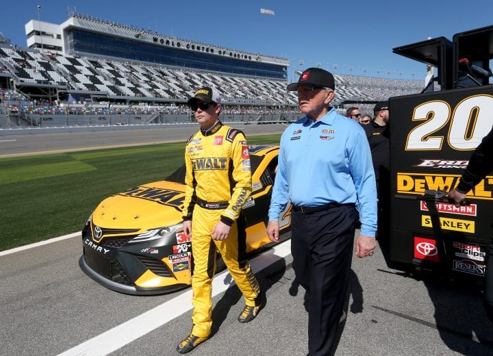 DAYTONA BEACH, FLORIDA - FEBRUARY 09: Erik Jones, driver of the #20 DEWALT Toyota, walks with team owner, Joe Gibbs during qualifying for the NASCAR Cup Series 62nd Annual Daytona 500 at Daytona International Speedway on February 09, 2020 in Daytona Beach, Florida. (Photo by Brian Lawdermilk/Getty Images) | Getty Images