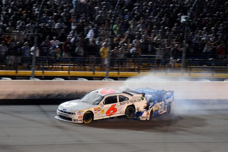 NEWTON, IA - AUGUST 06: Ricky Stenhouse Jr., driver of the #6 RickyvsTrevor.com Ford is hit by Carl Edwards, driver of the #60 Fastenal Ford, on the final lap during the NASCAR Nationwide Series U.S. Cellular 250 at Iowa Speedway on August 6, 2011 in Newton, Iowa. (Photo by Jason Smith/Getty Images for NASCAR) | Getty Images