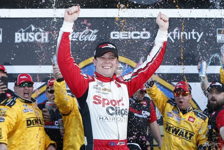 DAYTONA BEACH, FLORIDA - FEBRUARY 09: Erik Jones, driver of the #20 Sport Clips Toyota, celebrates in Victory Lane after winning the NASCAR Cup Series Busch Clash at Daytona International Speedway on February 09, 2020 in Daytona Beach, Florida. (Photo by Brian Lawdermilk/Getty Images) | Getty Images