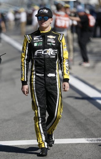 DAYTONA BEACH, FLORIDA - FEBRUARY 09:  Justin Haley, driver of the #16 Fraternal Order of Eagles Chevrolet, stands on the grid during qualifying for the NASCAR Cup Series 62nd Annual Daytona 500 at Daytona International Speedway on February 09, 2020 in Daytona Beach, Florida. (Photo by Brian Lawdermilk/Getty Images) | Getty Images