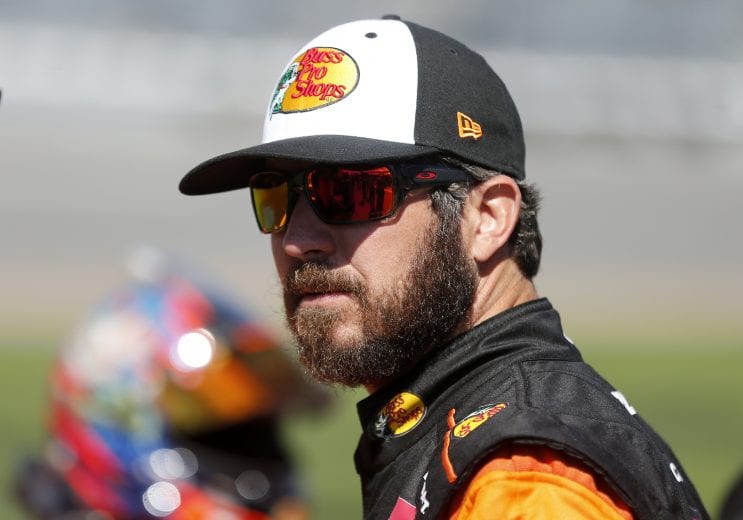 DAYTONA BEACH, FLORIDA - FEBRUARY 09: Martin Truex Jr., driver of the #19 Bass Pros Shops Toyota, stands on the grid  during qualifying for the NASCAR Cup Series 62nd Annual Daytona 500 at Daytona International Speedway on February 09, 2020 in Daytona Beach, Florida. (Photo by Brian Lawdermilk/Getty Images) | Getty Images