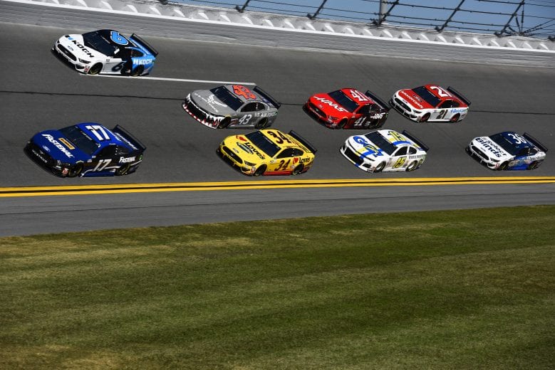 DAYTONA BEACH, FLORIDA - FEBRUARY 08: Chris Buescher, driver of the #17 Fastenal Ford, and Ryan Newman, driver of the #6 Koch Industries Ford, lead a pack of cars during practice for the NASCAR Cup Series 62nd Annual Daytona 500 at Daytona International Speedway on February 08, 2020 in Daytona Beach, Florida. (Photo by Jared C. Tilton/Getty Images) | Getty Images