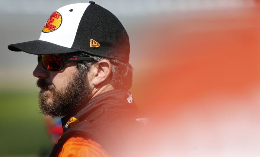 DAYTONA BEACH, FLORIDA - FEBRUARY 09: Martin Truex Jr., driver of the #19 Bass Pros Shops Toyota, stands on the grid during qualifying for the NASCAR Cup Series 62nd Annual Daytona 500 at Daytona International Speedway on February 09, 2020 in Daytona Beach, Florida. (Photo by Brian Lawdermilk/Getty Images) | Getty Images