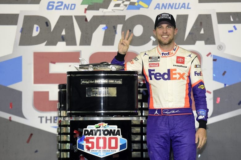 DAYTONA BEACH, FLORIDA - FEBRUARY 17: Denny Hamlin, driver of the #11 FedEx Express Toyota, poses with the trophy in Victory Lane after winning the NASCAR Cup Series 62nd Annual Daytona 500 at Daytona International Speedway on February 17, 2020 in Daytona Beach, Florida. (Photo by Jared C. Tilton/Getty Images) | Getty Images