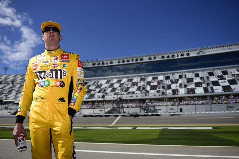 DAYTONA BEACH, FLORIDA - FEBRUARY 09: Kyle Busch, driver of the #18 M&M's Toyota, stands on the grid during qualifying for the NASCAR Cup Series 62nd Annual Daytona 500 at Daytona International Speedway on February 09, 2020 in Daytona Beach, Florida. (Photo by Jared C. Tilton/Getty Images) | Getty Images