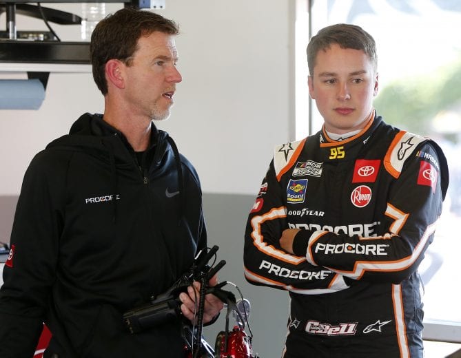 DAYTONA BEACH, FLORIDA - FEBRUARY 08: Christopher Bell, driver of the #95 Procore Toyota, talks with crew chief Jason Ratcliff during practice for the NASCAR Cup Series 62nd Annual Daytona 500 at Daytona International Speedway on February 08, 2020 in Daytona Beach, Florida. (Photo by Brian Lawdermilk/Getty Images) | Getty Images