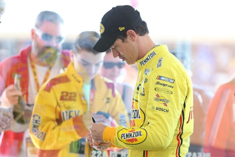 LAS VEGAS, NEVADA - FEBRUARY 21: Joey Logano, driver of the #22 Pennzoil Ford, signs autographs during practice for NASCAR Cup Series Penzoil 400 presented by Jiffy Lube at Las Vegas Motor Speedway on February 21, 2020 in Las Vegas, Nevada. (Photo by Matt Sullivan/Getty Images) | Getty Images