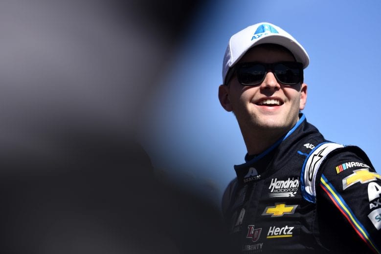 DAYTONA BEACH, FLORIDA - FEBRUARY 09: William Byron, driver of the #24 Axalta 'Color of the Year' Chevrolet, stands on the grid during qualifying for the NASCAR Cup Series 62nd Annual Daytona 500 at Daytona International Speedway on February 09, 2020 in Daytona Beach, Florida. (Photo by Jared C. Tilton/Getty Images) | Getty Images