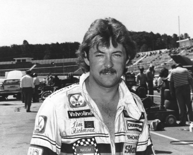 MARTINSVILLE, VA - 1982:  Tim Richmond poses at Martinsville Speedway during the 1982 NASCAR Cup season. Driving for Jim Stacy, Richmond won the first two Cup races of his career, sweeping both events at Riverside International Raceway in Riverside, California. (Photo by ISC Images & Archives via Getty Images)