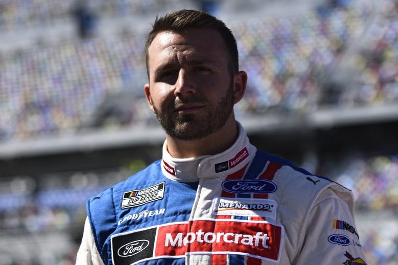 DAYTONA BEACH, FLORIDA - FEBRUARY 09: Matt DiBenedetto, driver of the #21 Motorcraft/Quick Lane Ford, stands on the grid during qualifying for the NASCAR Cup Series 62nd Annual Daytona 500 at Daytona International Speedway on February 09, 2020 in Daytona Beach, Florida. (Photo by Jared C. Tilton/Getty Images) | Getty Images