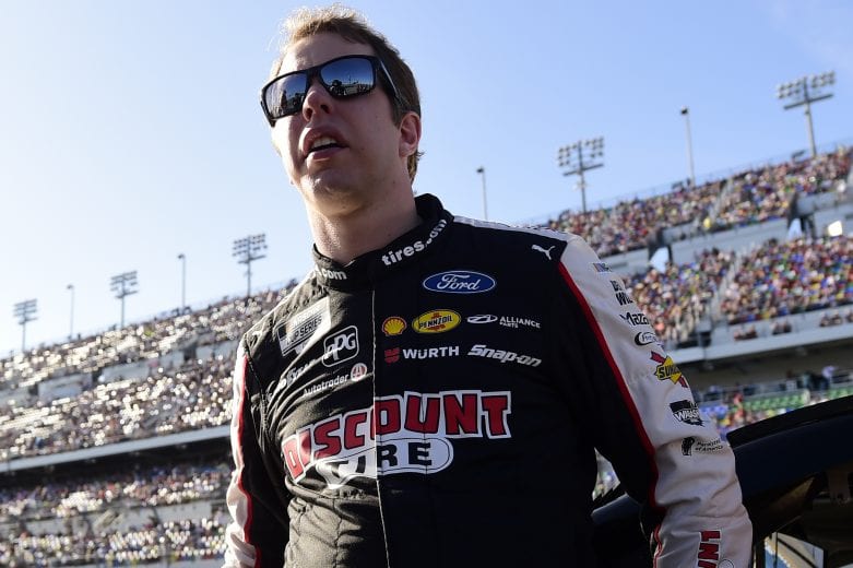 DAYTONA BEACH, FLORIDA - FEBRUARY 17: Brad Keselowski, driver of the #2 Discount Tire Ford, stands on the grid  during the NASCAR Cup Series 62nd Annual Daytona 500 at Daytona International Speedway on February 17, 2020 in Daytona Beach, Florida. (Photo by Jared C. Tilton/Getty Images) | Getty Images