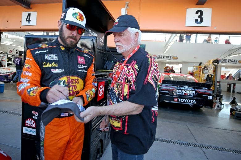 LAS VEGAS, NEVADA - FEBRUARY 21: Martin Truex Jr., driver of the #19 Bass Pro Shops Toyota, signs autographs during practice for NASCAR Cup Series Penzoil 400 presented by Jiffy Lube at Las Vegas Motor Speedway on February 21, 2020 in Las Vegas, Nevada. (Photo by Matt Sullivan/Getty Images) | Getty Images