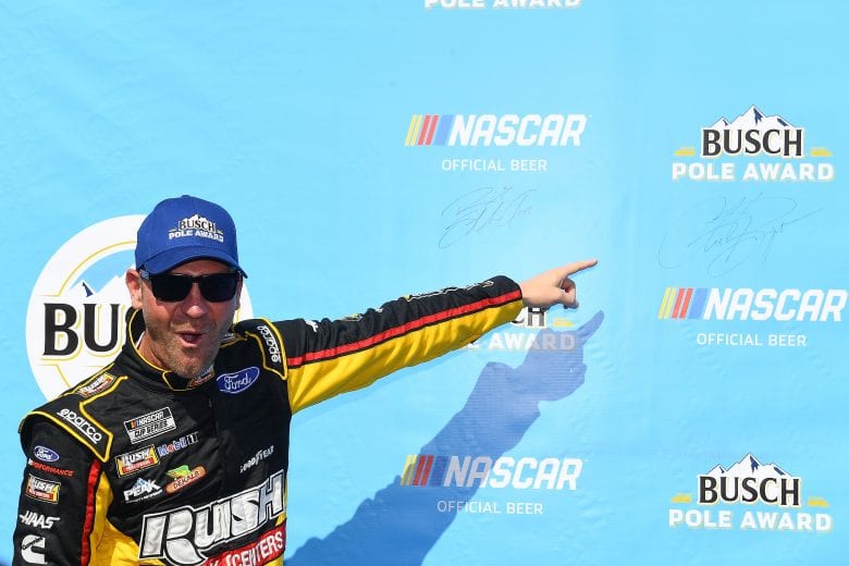 FONTANA, CALIFORNIA - FEBRUARY 29:  Clint Bowyer, driver of the #14 RushHAAS CNC, points to his autograph after qualifying for the pole position for the NASCAR Cup Series Auto Club 400 at Auto Club Speedway on February 29, 2020 in Fontana, California. (Photo by Stacy Revere/Getty Images) | Getty Images